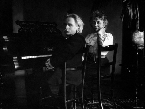 norwegian-composer-edvard-grieg-with-his-wife-seated-in-front-of-a-piano.jpg